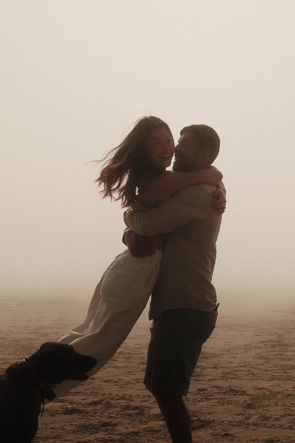 Couple embracing on the beach