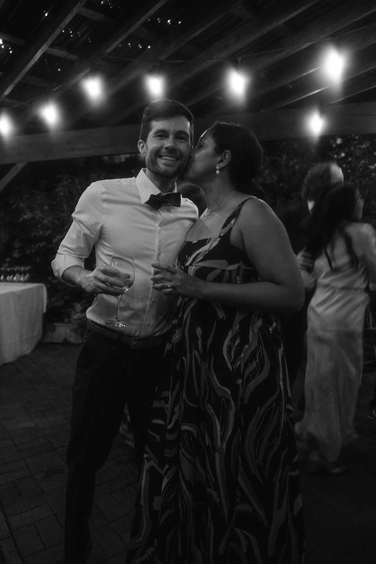 Couple celebrating at a wedding reception